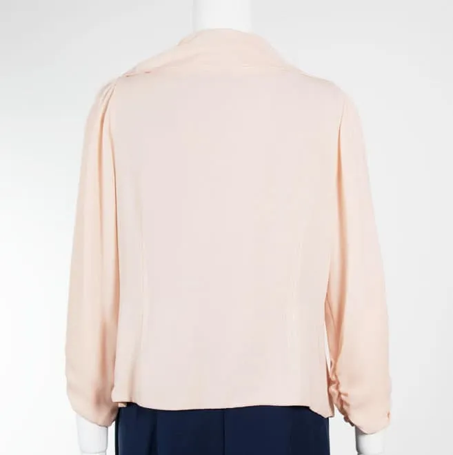 ピンクベージュの七分袖ボレロ