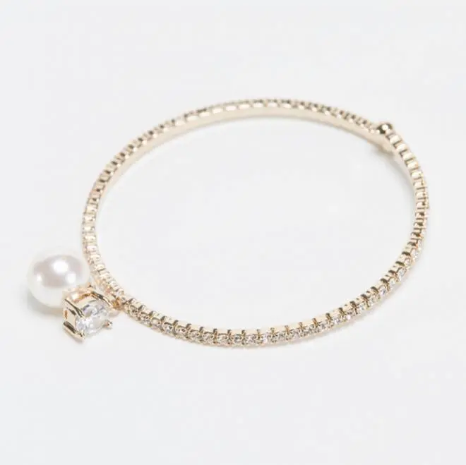 ゴールドのパールとビジュー付バングル