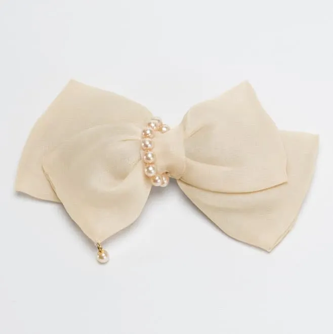 ベージュのダブルリボンパール付きバレッタ