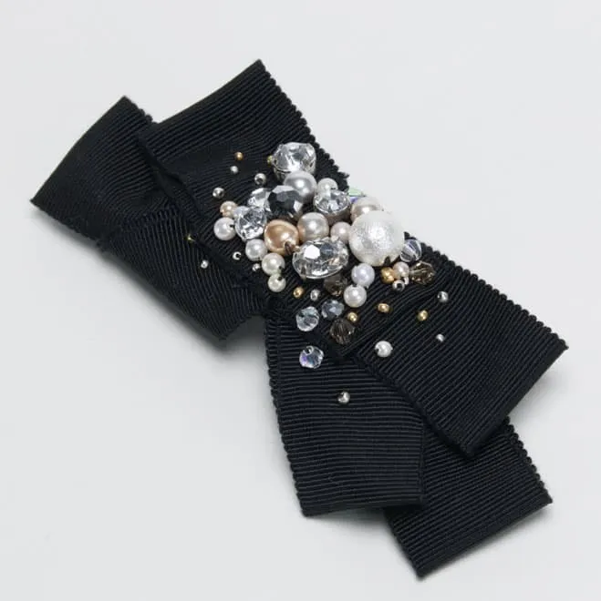 ブラックのリボンビジュー付きバレッタ