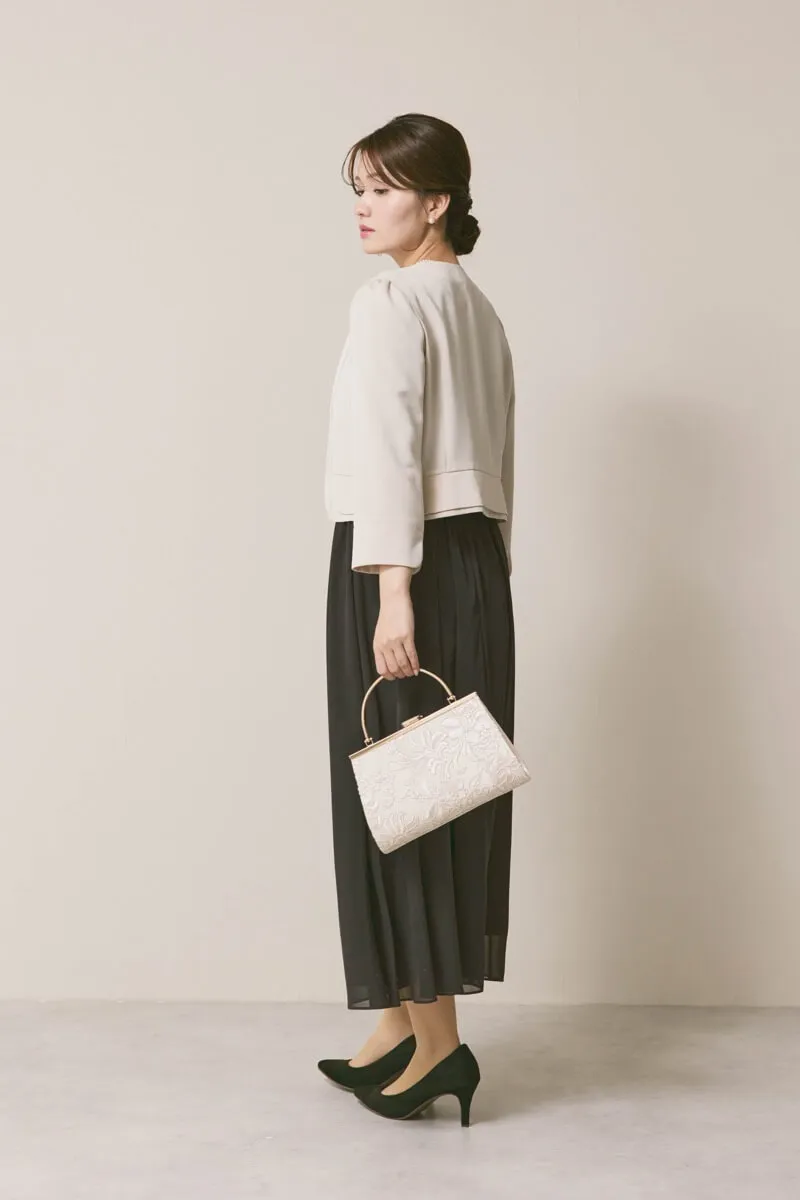 チャコールグレーのパワーショルダーレースドレス