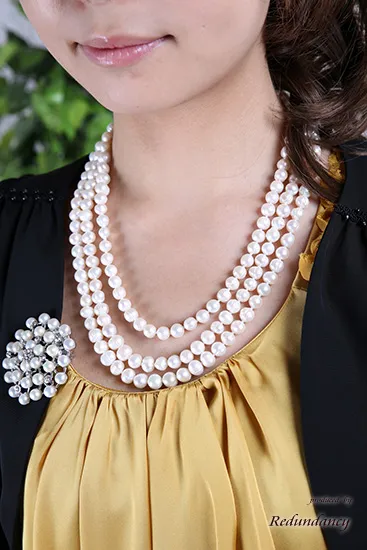 ホワイトパールの結晶ブローチ