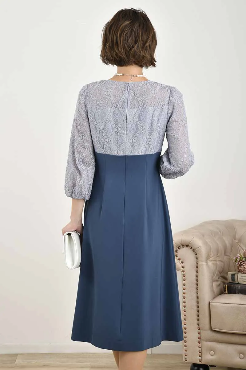 ブルーグレーのボリュームスリーブ切替えドレス