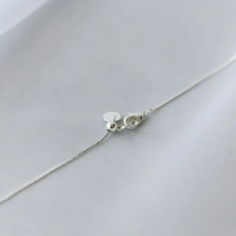 シルバーのパール×ダストボールネックレス