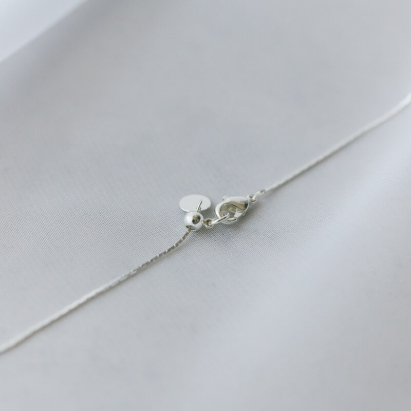 シルバーのパール×ダストボールネックレス