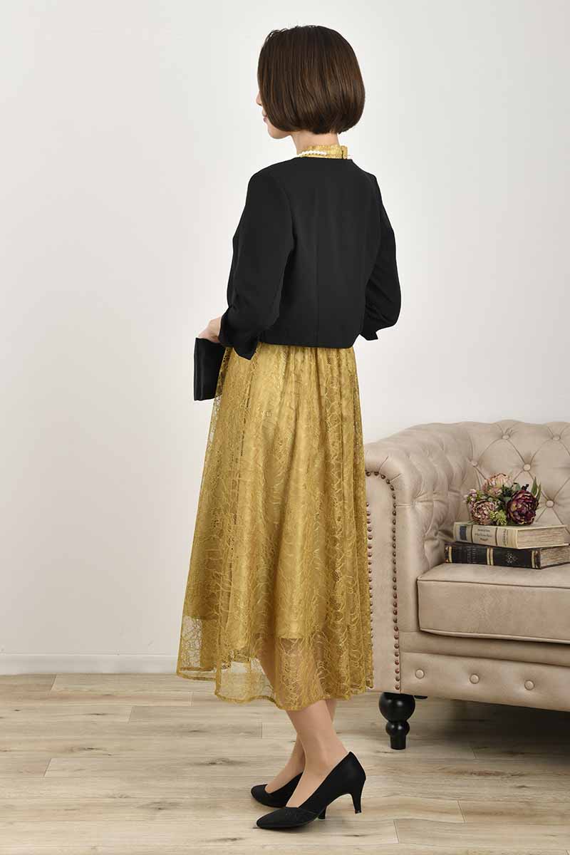 マスタードイエローのプチハイネック総レースドレス