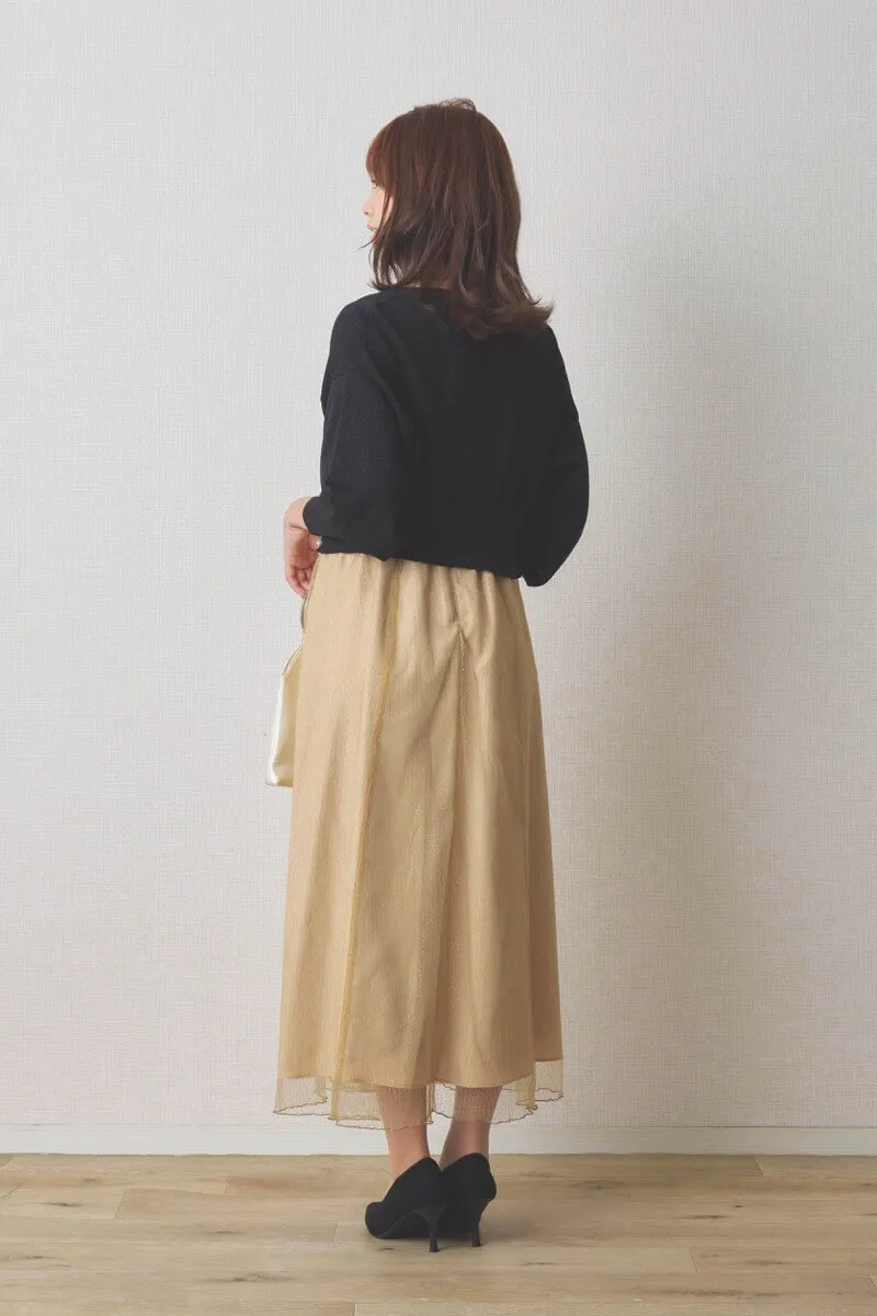 ベージュのシャイニーチュールドレス