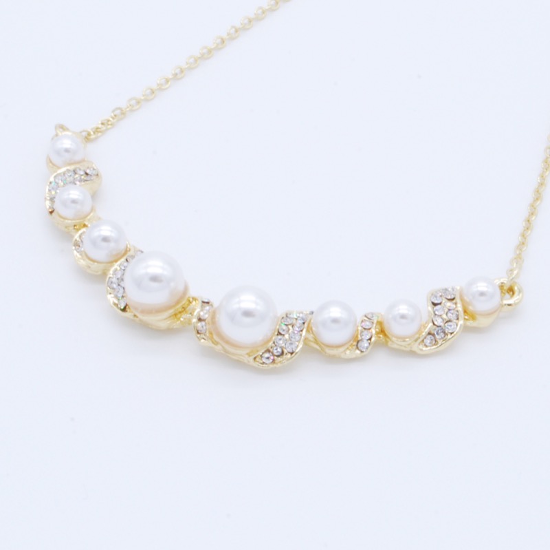 パールとビジューのツイストネックレス(ゴールド)