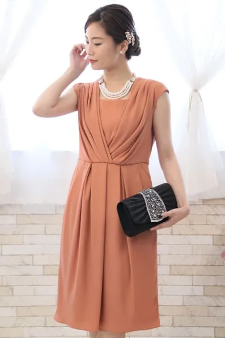 オレンジのカシュクール風タック入りドレス