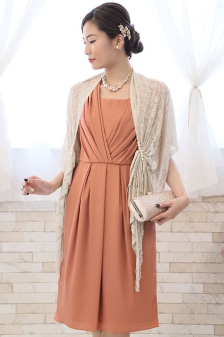 オレンジのカシュクール風タック入りドレス