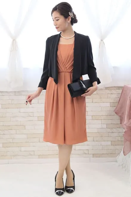 オレンジのカシュクール風タック入りドレス