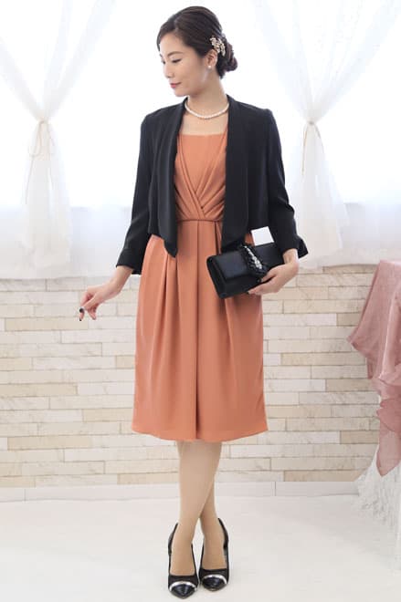 オレンジのカシュクール風タック入りドレス