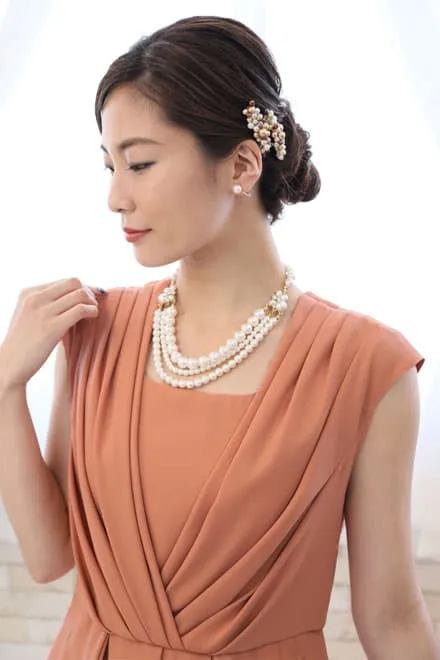 オレンジのカシュクール風タック入りドレス