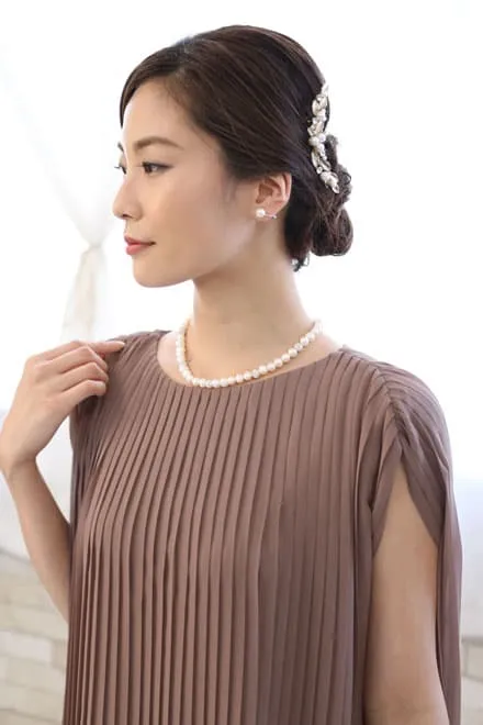 ブラウンのプリーツトップスドレス