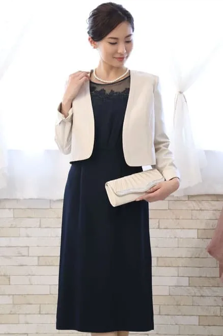 ネイビーの花柄レースボリュームスリーブドレス