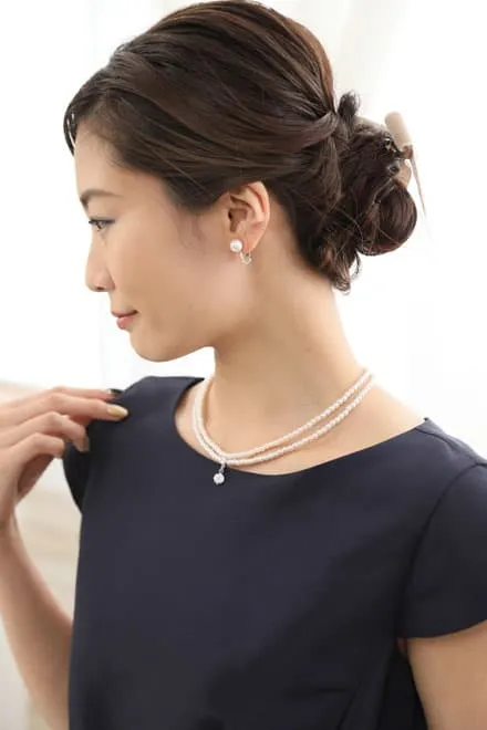 ネイビーのチューリップスリーブウエストリボン付きドレス