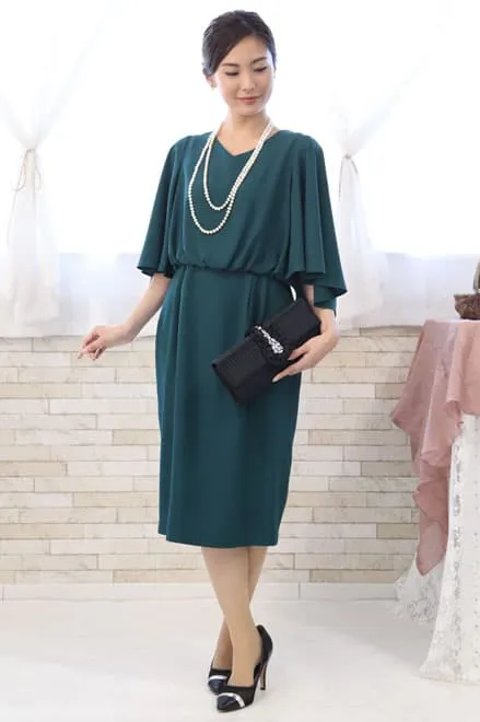 ブルーグリーンのボリュームスリーブドレス