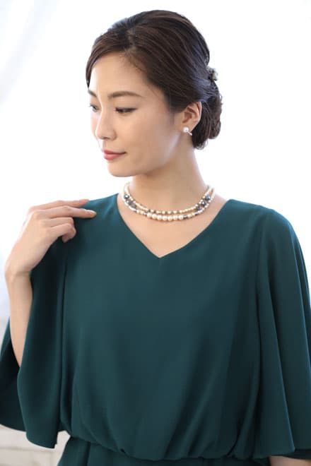 ブルーグリーンのボリュームスリーブドレス