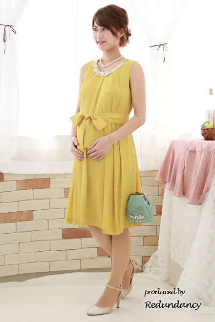 イエローのパールビジュー付きウエストリボンドレス
