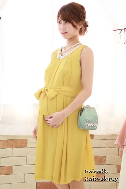 イエローのパールビジュー付きウエストリボンドレス