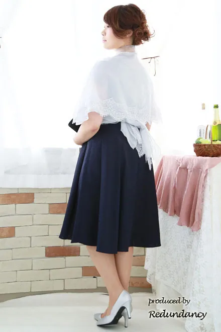 ネイビーの織柄花模様ラメドレス