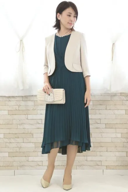 ブルーグリーンのアシンメトリープリーツドレス