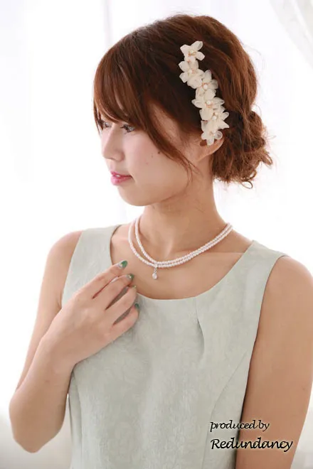 ミントグリーンの花柄ジャガードタックフレアドレス