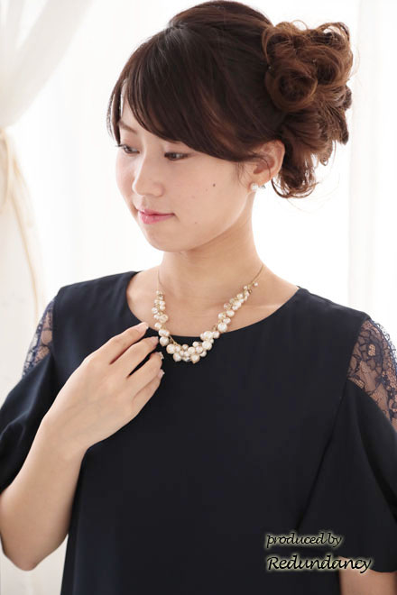 ネイビーのリボン風スリーブドレス