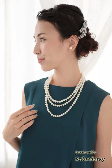 ブルーグリーンのレーススリットIラインドレス