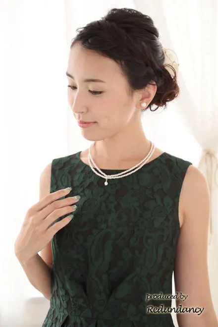 グリーンの花模様ノースリーブドレス