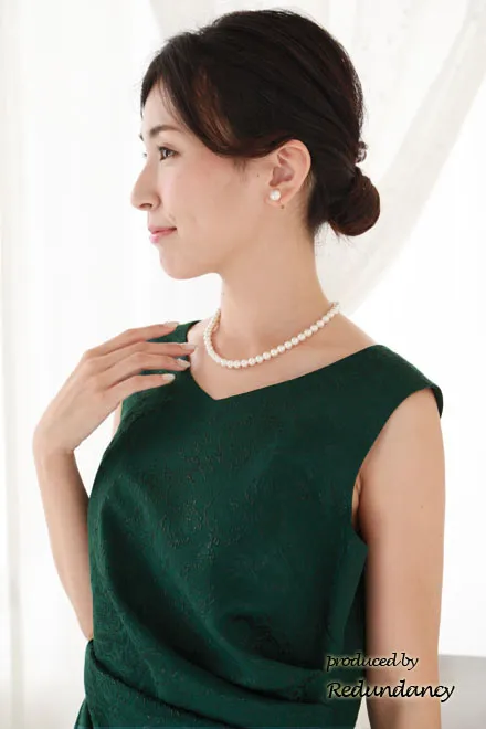 グリーンのウエストドレープ花柄ドレス