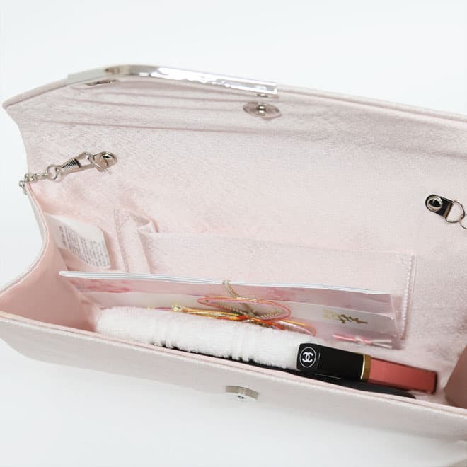 ピンクのラメ入りクラッチバッグ