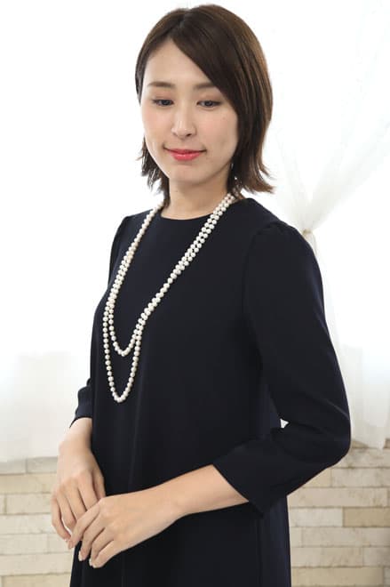 ネイビーのバックプリーツAラインドレス