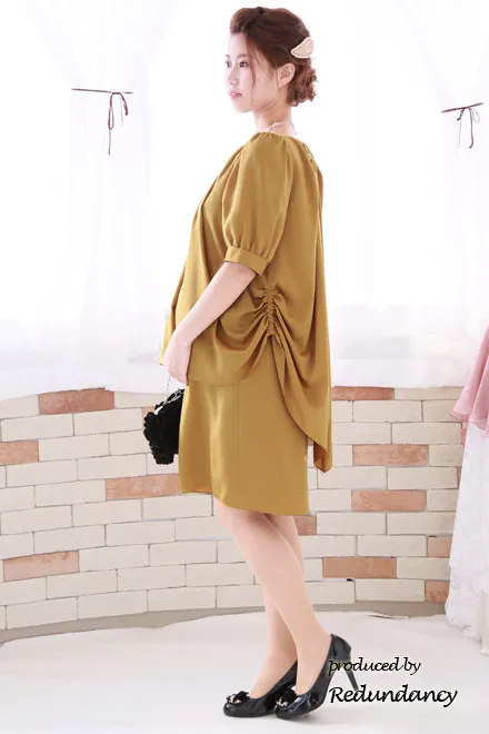 マスタードイエローのバルーンスリーブマタニティドレス