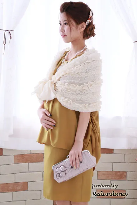 マスタードイエローのバルーンスリーブマタニティドレス