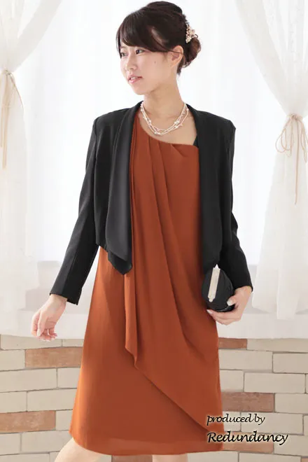 オレンジ×グリーンのショルダーモチーフドレス