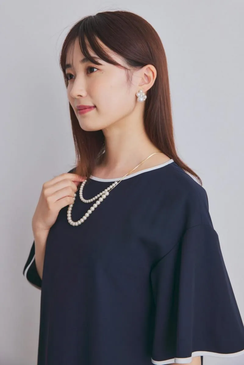 ネイビーのパイピングAラインワンピース