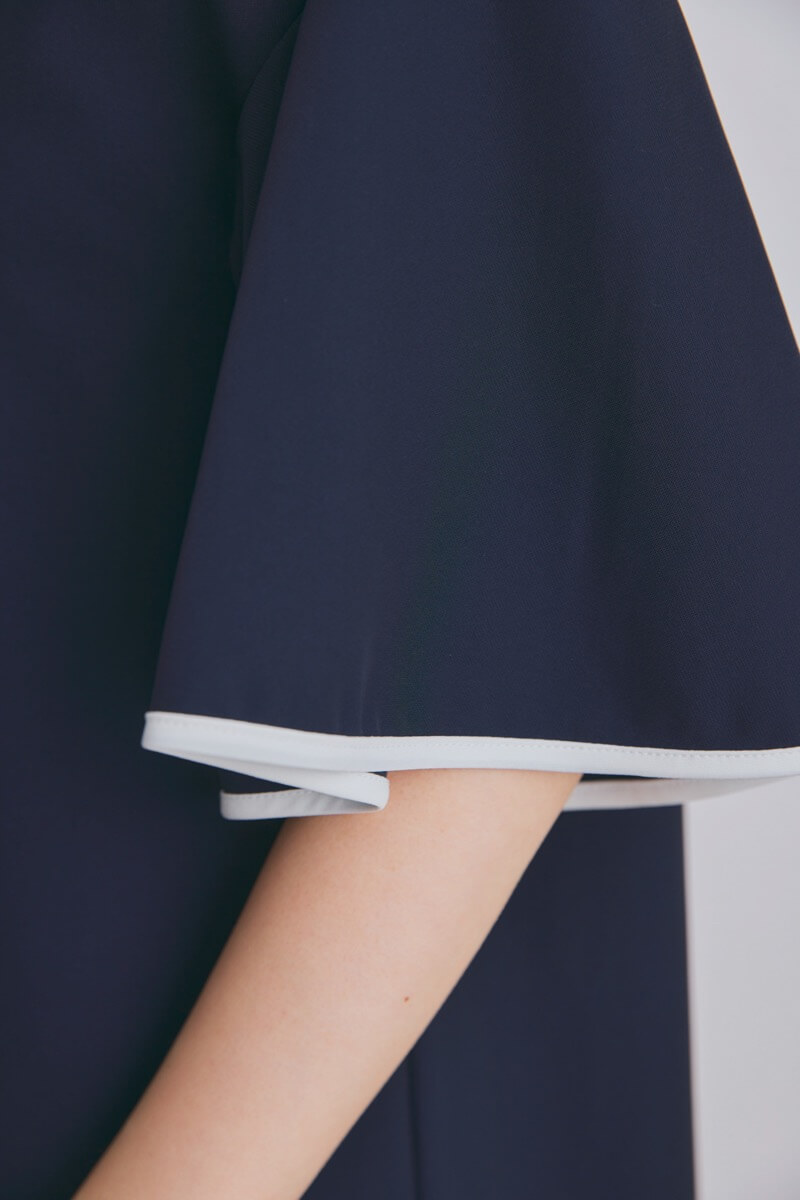 ネイビーのパイピングAラインワンピース
