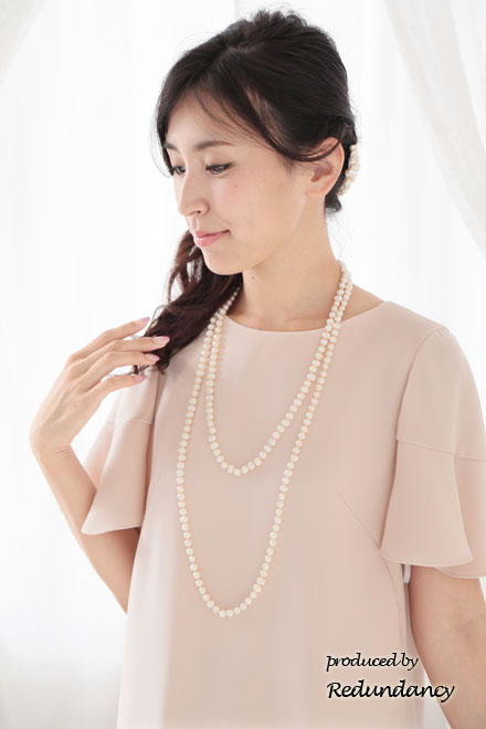 ライトピンクのフレアスリーブリラックスドレス