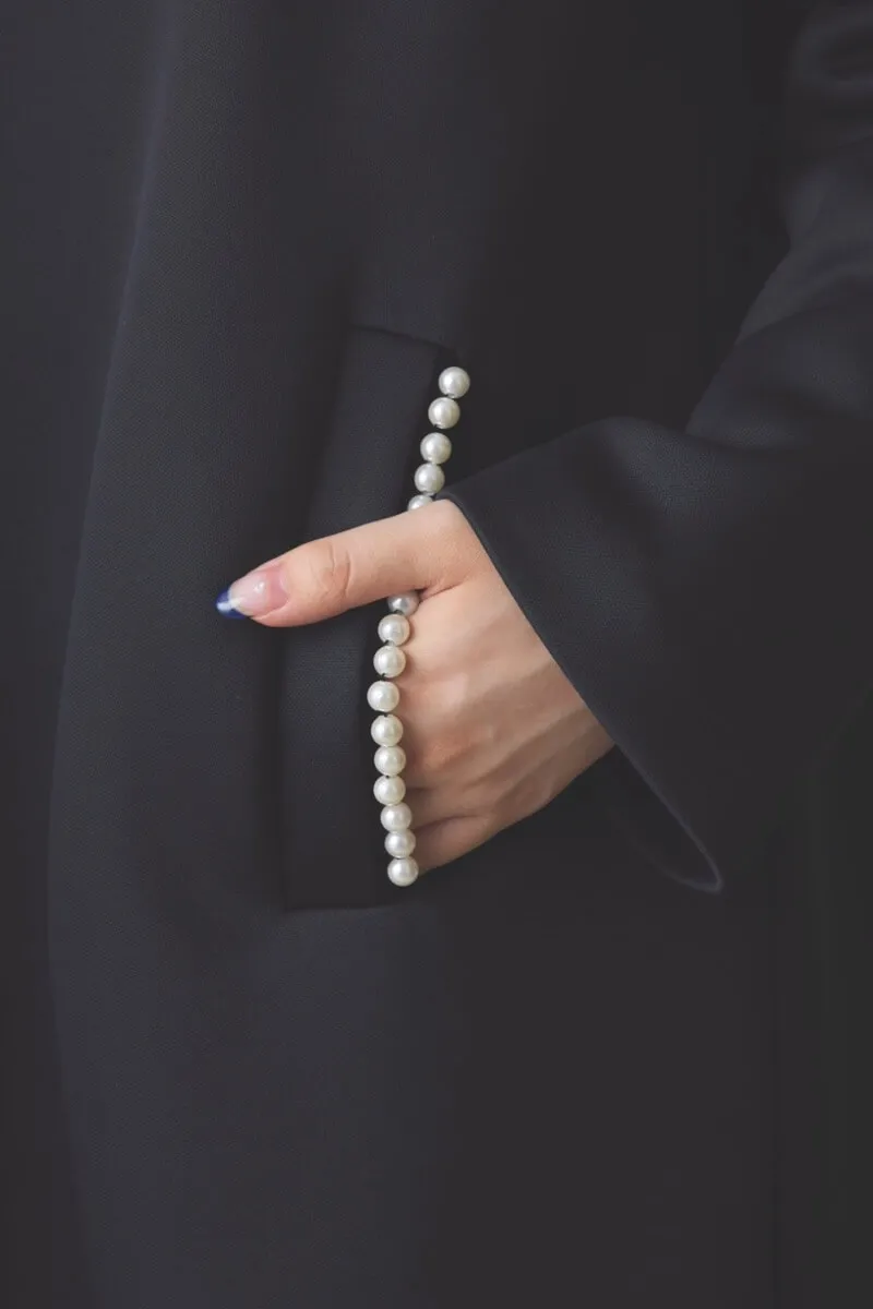 ブラックのパールボンディングコート