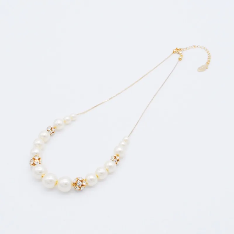 ゴールドチェーンのパール×ビジューボールネックレス