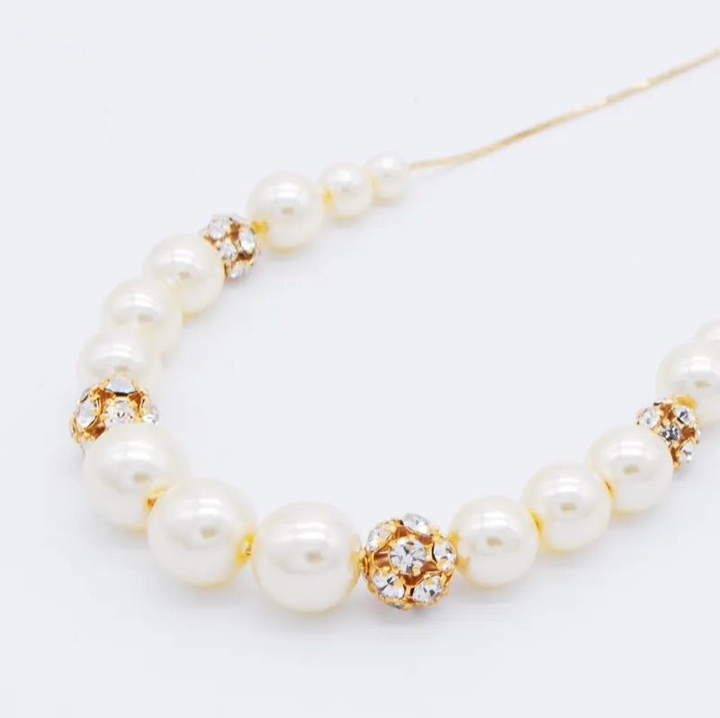 ゴールドチェーンのパール×ビジューボールネックレス