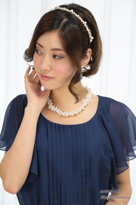 ネイビーのラッフルスリーブミディ丈ドレス