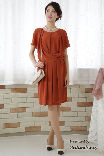 テラコッタオレンジのドレープ膝丈ドレス