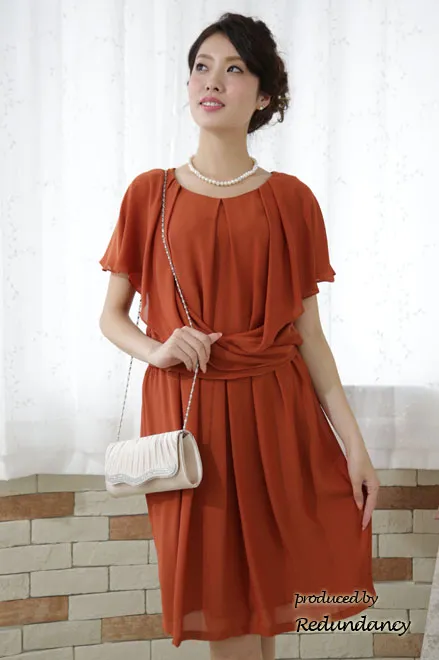 テラコッタオレンジのドレープ膝丈ドレス