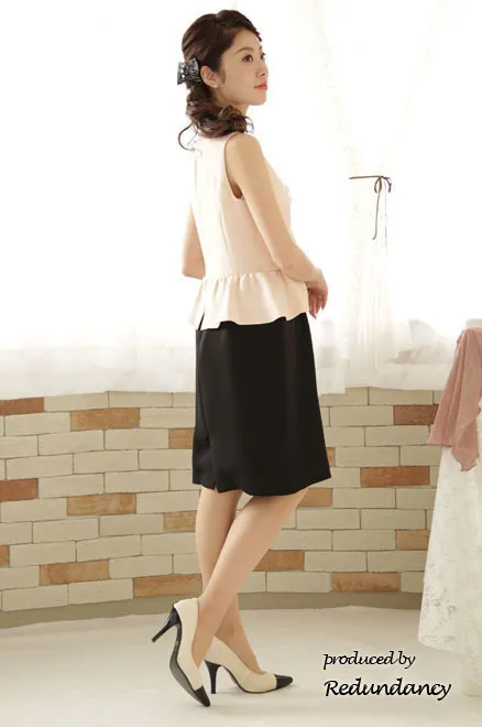 ホワイト×ブラックのツーピース風ペプラムドレス