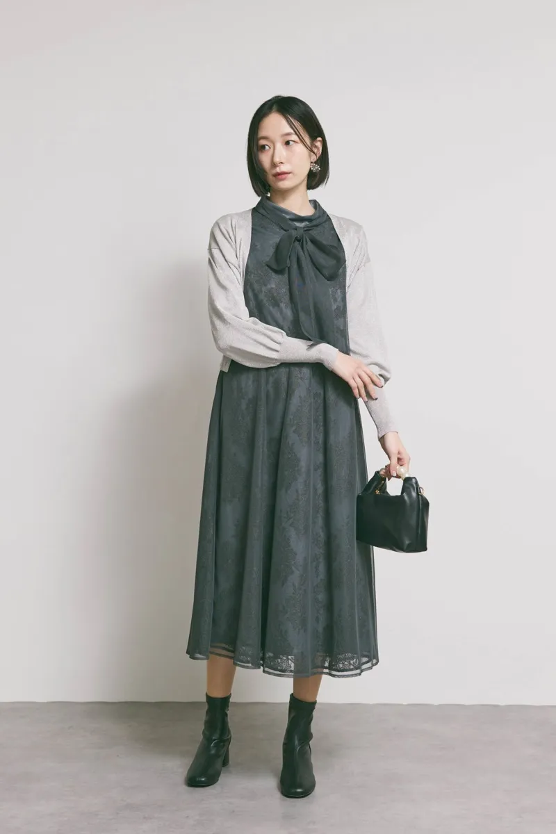 ブラックのパールハンドルミニバッグ