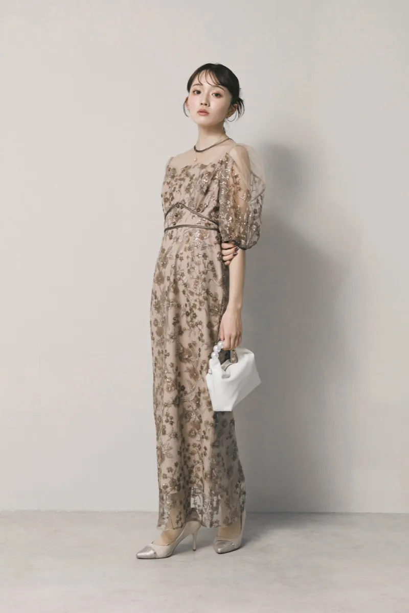 ホワイトのパールハンドルミニバッグ