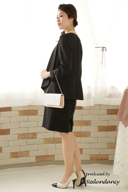 ホワイト×ブラックのツーピース風ペプラムドレス