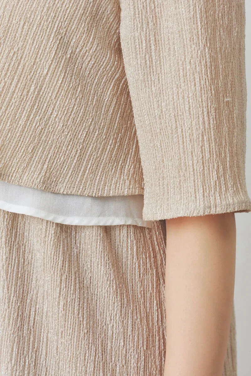 ベージュの楊柳ニットドレス